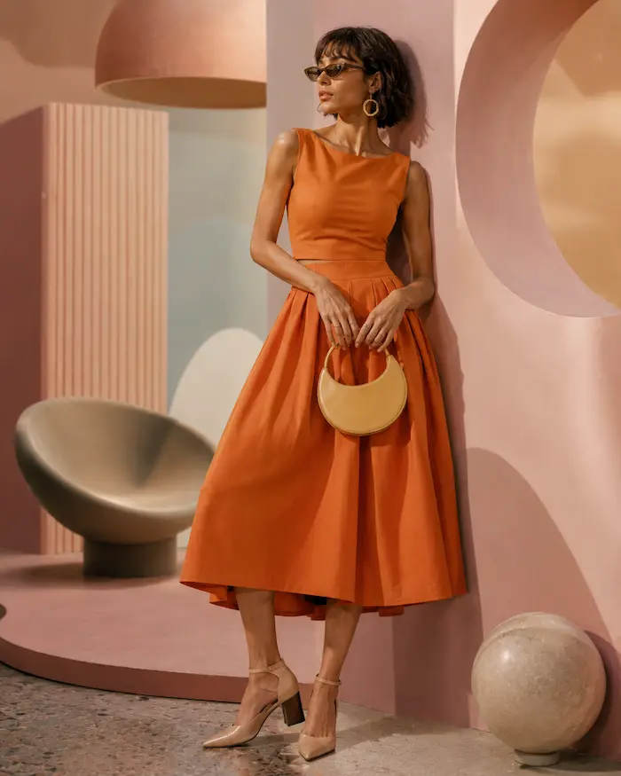 Woman styled with a statement belt and modern accessories