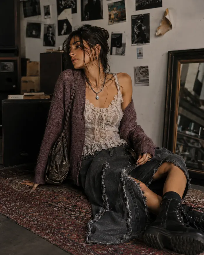 Woman wearing romantic textured layers and modern shoes